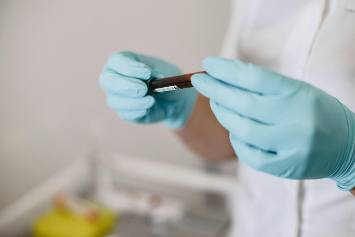 Parent reviewing child blood test results with pediatrician